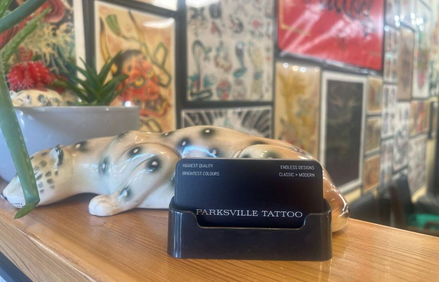 Parksville Tattoo - Front desk and business card